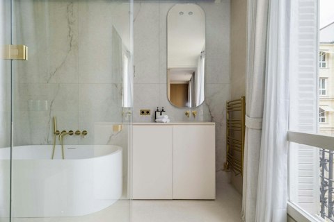 End the day with a soak in the freestanding bathtub, a quietly elegant retreat