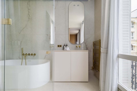 End the day with a soak in the freestanding bathtub, a quietly elegant retreat