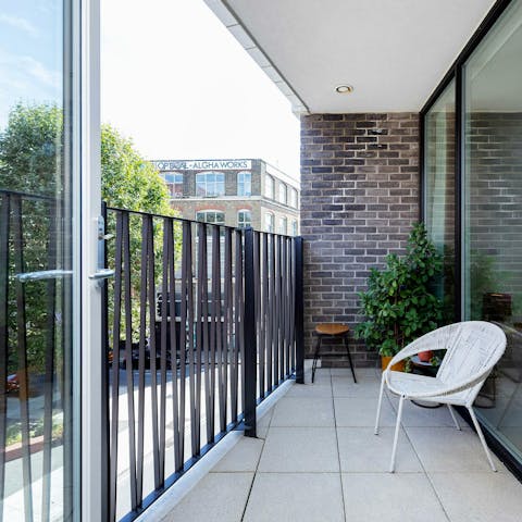 Enjoy a breath of fresh air on the balcony