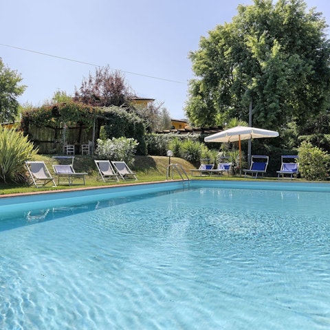 Soak up the Tuscan sunshine by the pool