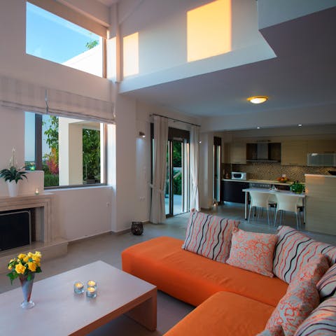 Chill out in the bright and breezy living space with a glass of Cretan wine