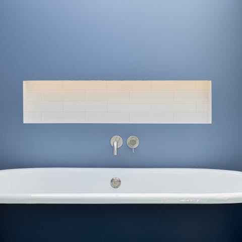Run a steamy bath in the gorgeous blue bathroom and enjoy some me-time