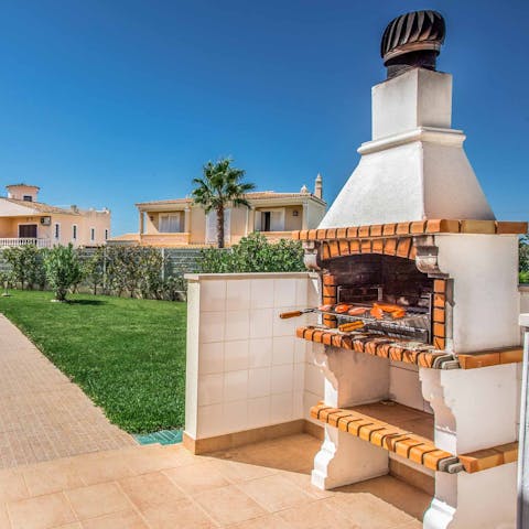 Cook up a storm on the brick-built barbecue