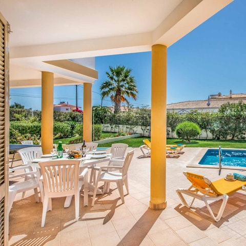 Feast alfresco on the covered poolside terrace