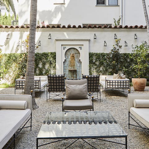 Relax in the communal Renaissance-inspired garden