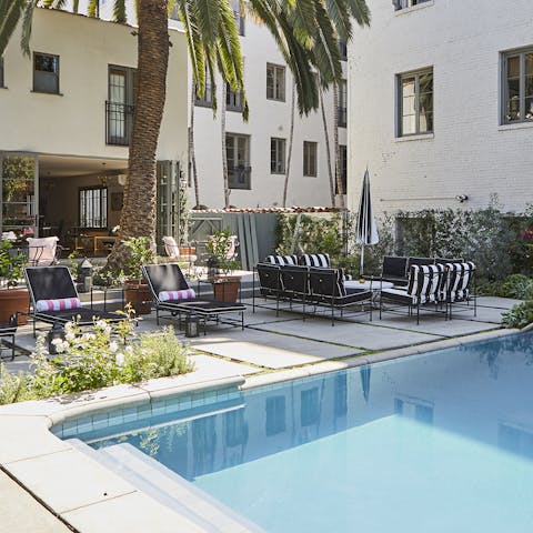 Spend afternoons taking dips in the communal saltwater pool