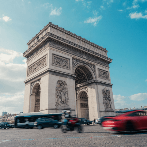 Take a fifteen-minute Metro to the Arc de Triomphe