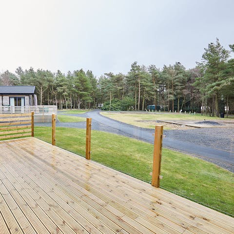 Soak in the peace and tranquility of the area by sitting out on the deck