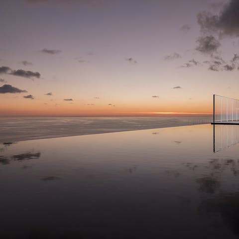 Catch the sunset at the best seat in the house, maybe even on the whole island