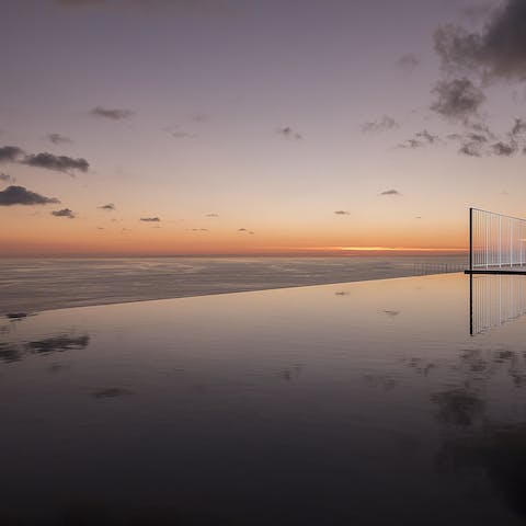 Catch the sunset at the best seat in the house, maybe even on the whole island