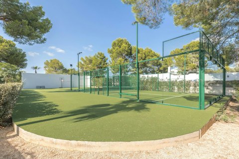 Serve out a match on the full-size padel court