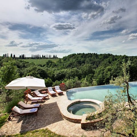 Soak in the pool as you take in the countryside views