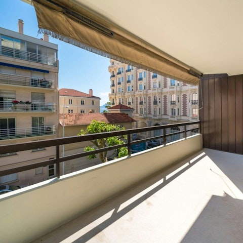 Enjoy a glass of Champagne on the private balcony