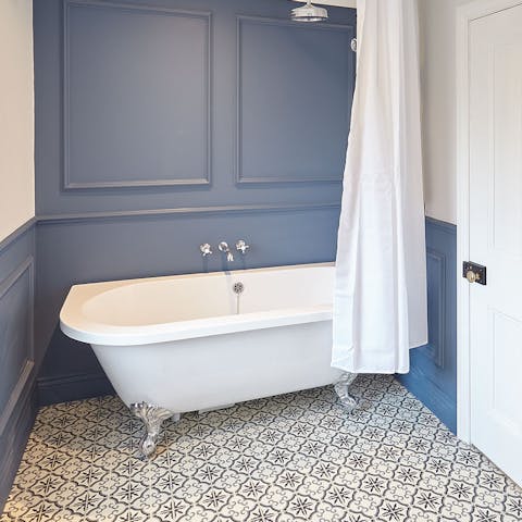 Get comfortable in the clawfoot tub after a long day of hiking and sea air