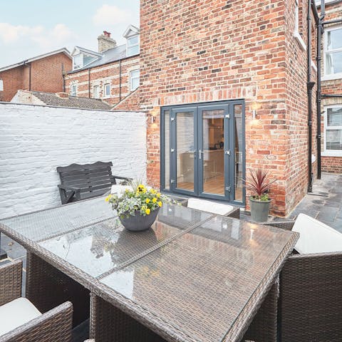 Savour your dinner at the table in your private courtyard on a balmy evening