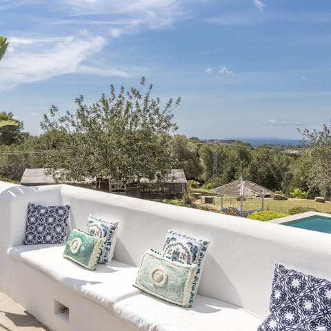 Enjoy sea and country views from the master suite's balcony