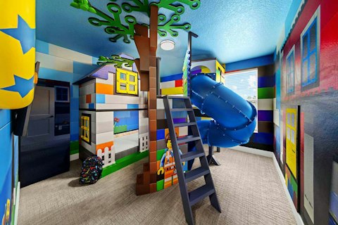 Slide into bedtime in the full-scale Lego treehouse bedroom
