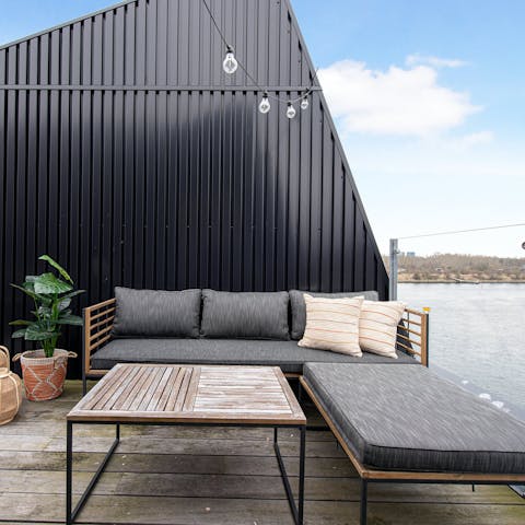 Soak up the waterside vistas with coffees on the private terrace