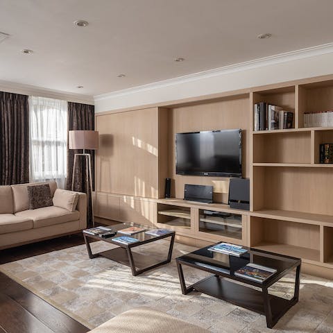 Flick through a magazine in the stylish living space