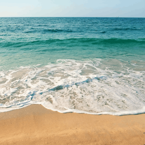 Spend the day at the beach, just a short walk from the villa