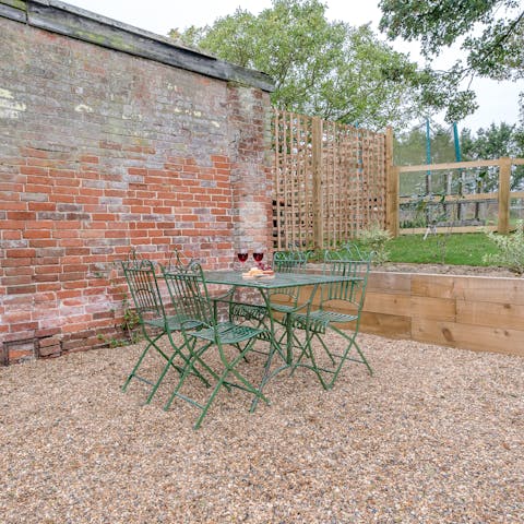 Enjoy a glass of wine in the garden