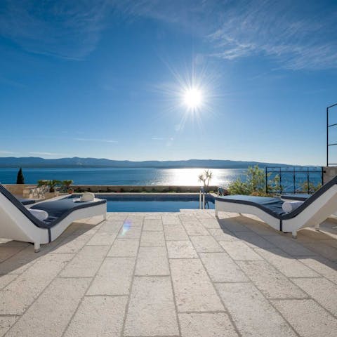 Drink in the fabulous Adriatic view from the comfort of a lounger