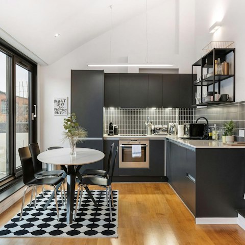 Rustle up something delicious in the sleek kitchen