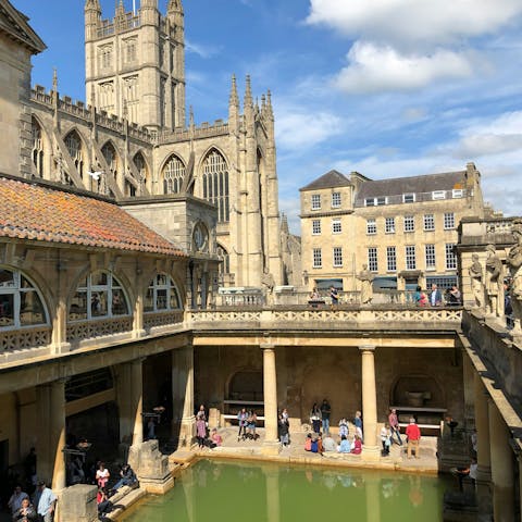Visit the iconic Roman Baths, just moments away