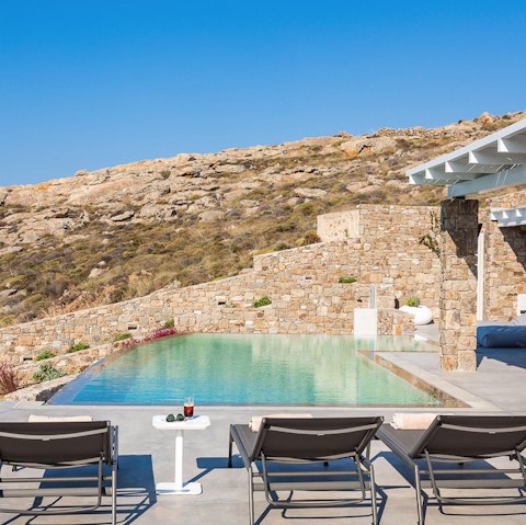 Spend lazy days lounging by the pool