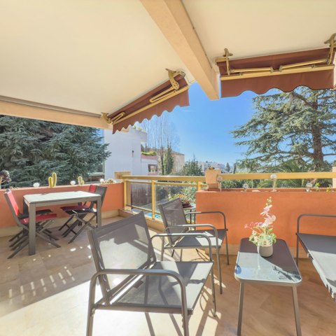 Relax and dine on the pretty covered terrace