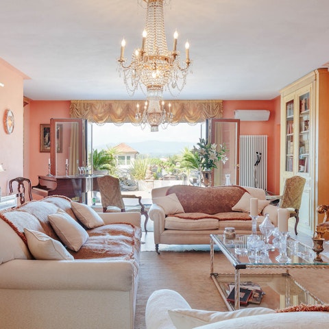 Fall in love with the penthouse apartment’s antiques and old-world character