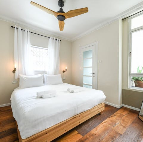 Wake up peacefully in your bright and airy bedroom