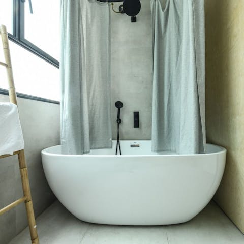 Soak in your bathtub for a relaxing step in your nighttime routine