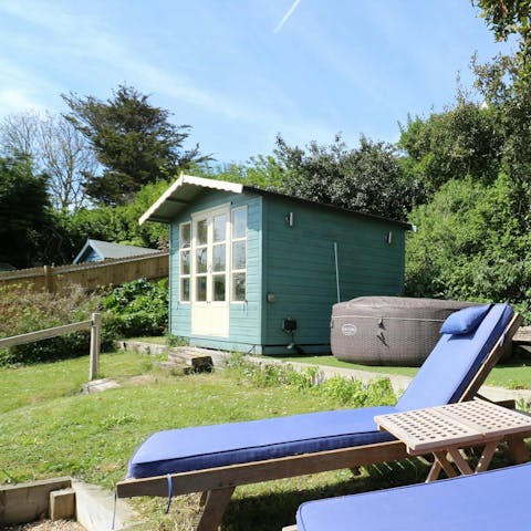 Lounge in the sun or unwind in the hot tub