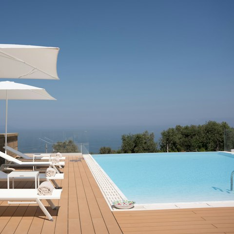 Spend blissful days lounging by the private pool