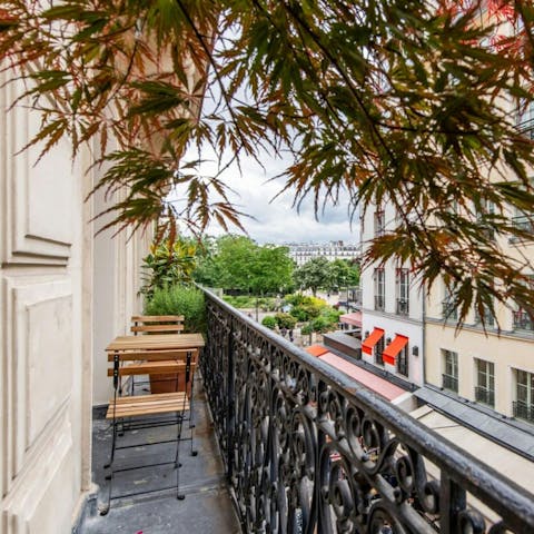 Watch the world go by with a coffee on the balcony