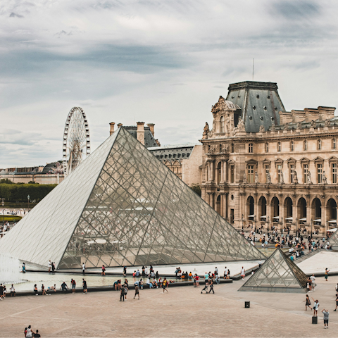 Marvel at masterpieces in the Louvre, a ten-minute walk away