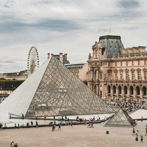 Marvel at masterpieces in the Louvre, a ten-minute walk away