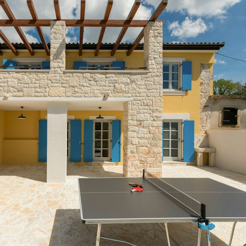 Play some ping pong in the sunshine