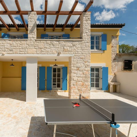 Play some ping pong in the sunshine