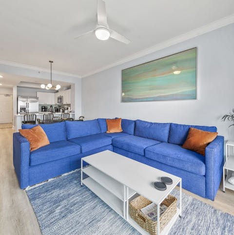 Enjoy a movie night on the sumptuous sofa – the smart TV has Netflix and Apple TV