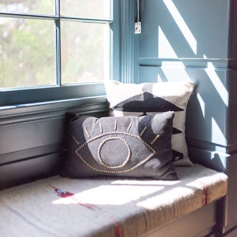 Curl up with a book in the cosy reading nook