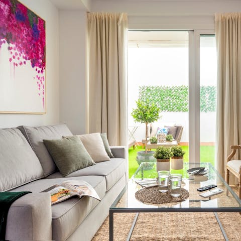 Slide back the terrace doors in the lounge and feel the breeze stream through