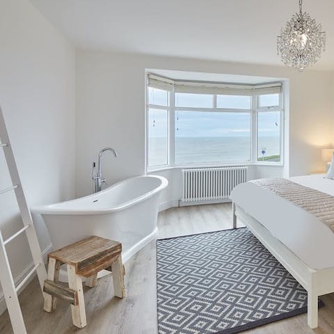 Soak up the sea views in the sumptuous tub in the master bedroom