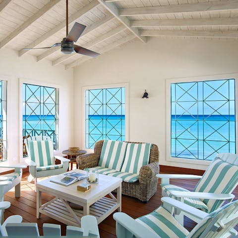 Unwind with a drink and endless sea vistas