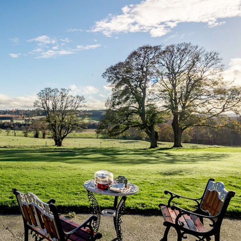 Savour a cup of coffee alongside sprawling scenic scenery