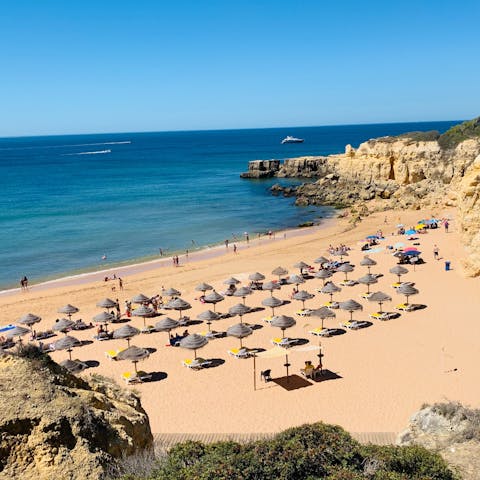 Take a fifteen-minute drive down to the Ancao Beach for a dip in the ocean