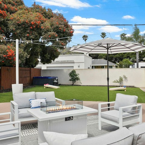 Relax in the backyard, where there's a firepit and hot tub