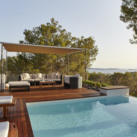 Relax in style by the scenic pool