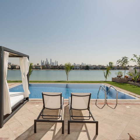 Lounge poolside, slipping into the cool water when the heat gets a bit much